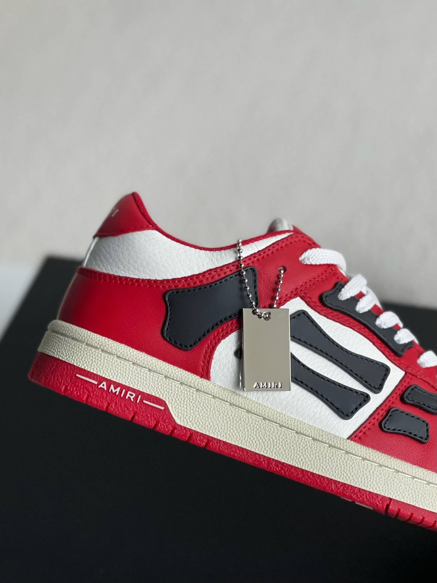 A*RI Bone Sneakers