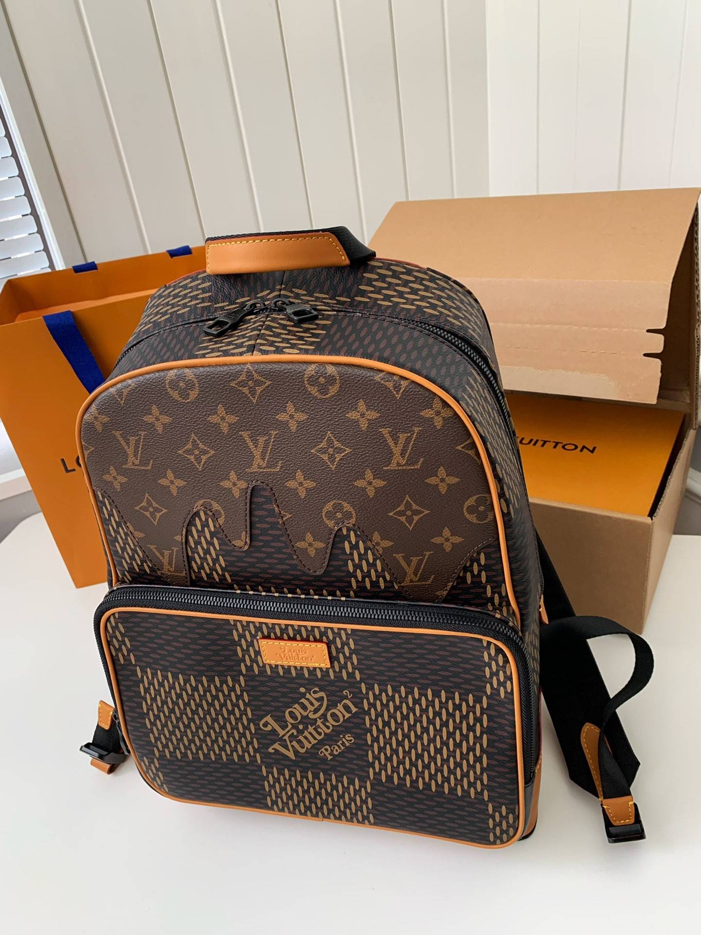 L*V x Nigo Co branded Campus Men