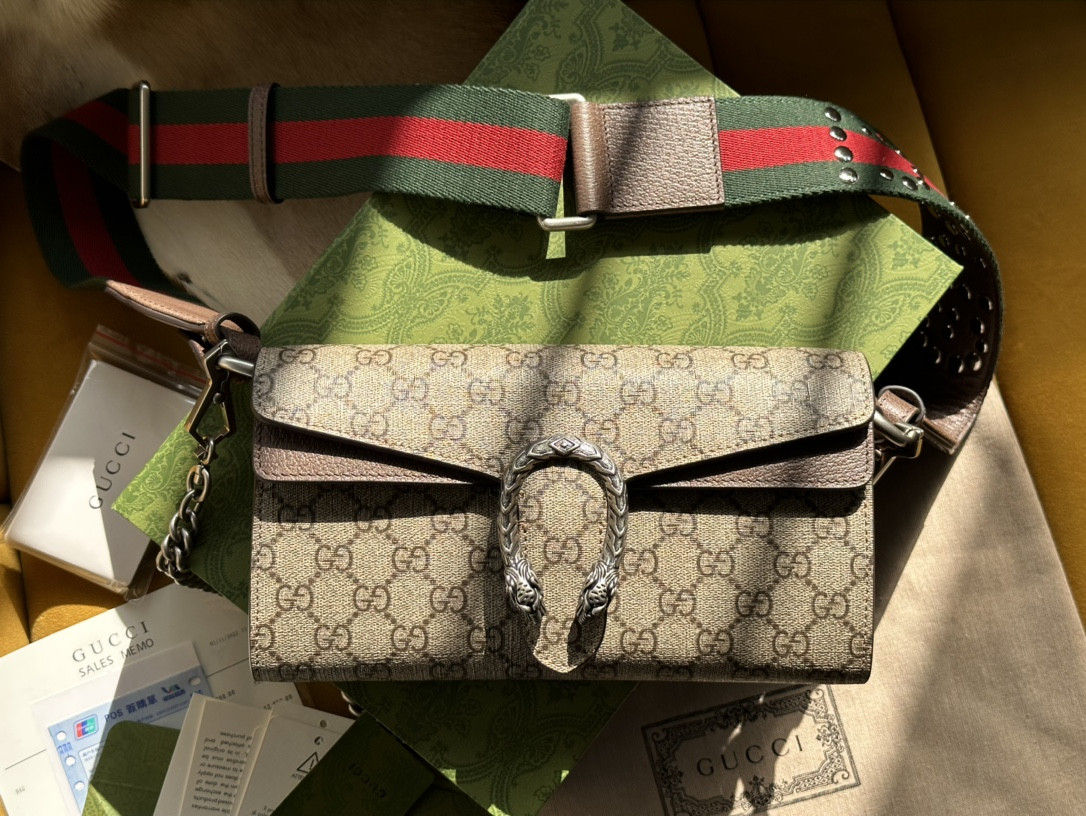 G*u*i dionysus bag